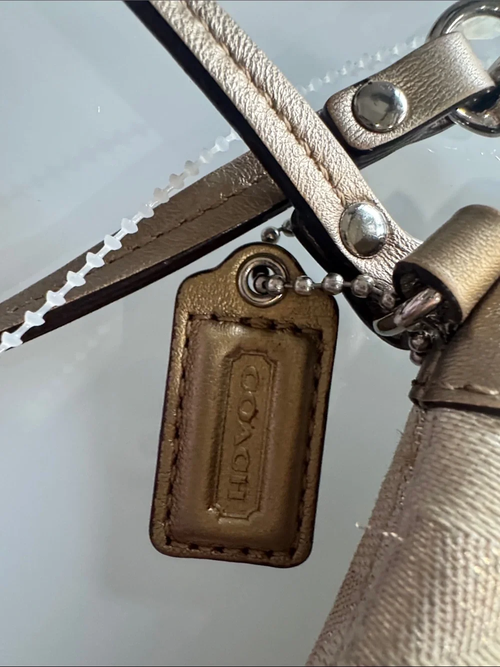 Coach Metallic Signature Wristlet in Champagne Gold
